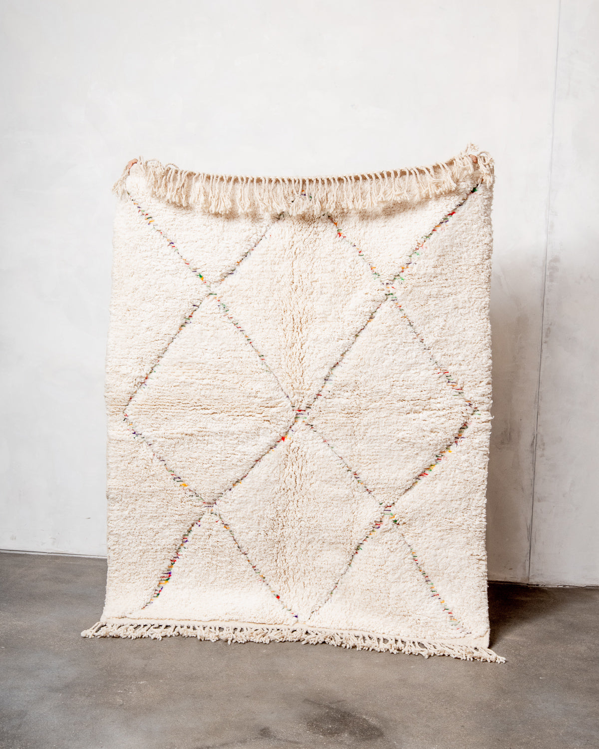 Modern, designer, handcrafted Berber rug from Morocco. Beniourain carpet with beautiful colours and patterns and fluffy wool texture.